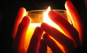 centering prayer - candle in hands
